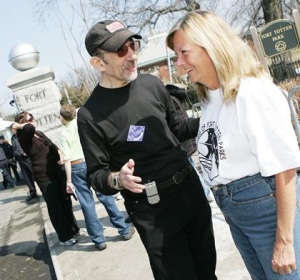 Rally organizer Warren Schreiber talks with a fellow Bay Terrace resident Rosemarie Brennan at a rally outside of the gates of Fort Totten in Bayside. Photo by Christina Santucci